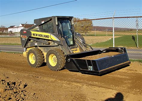 dirt rake skid steer|skid steer rock rake attachment.